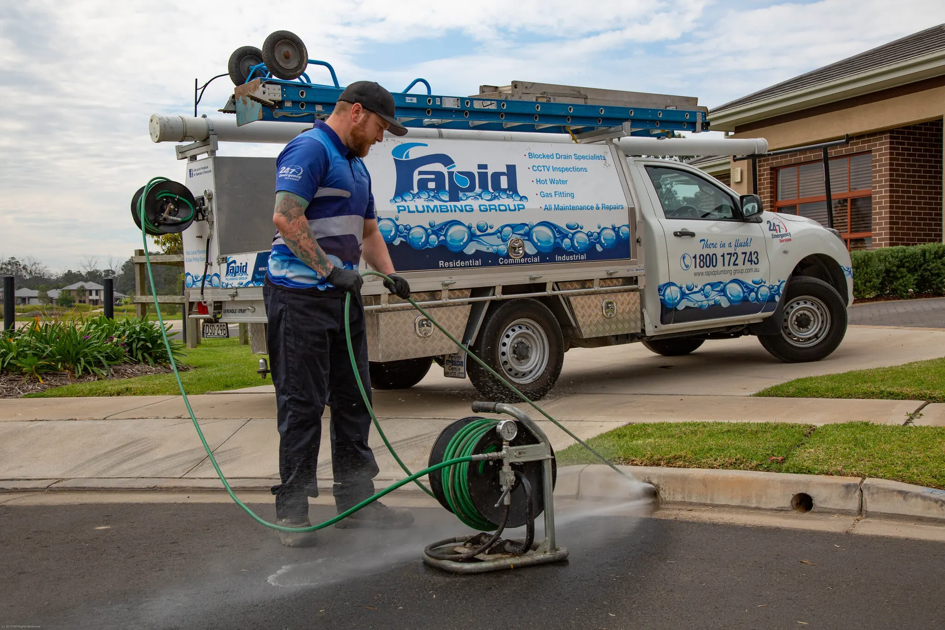 Plumber clearing a blocked drain