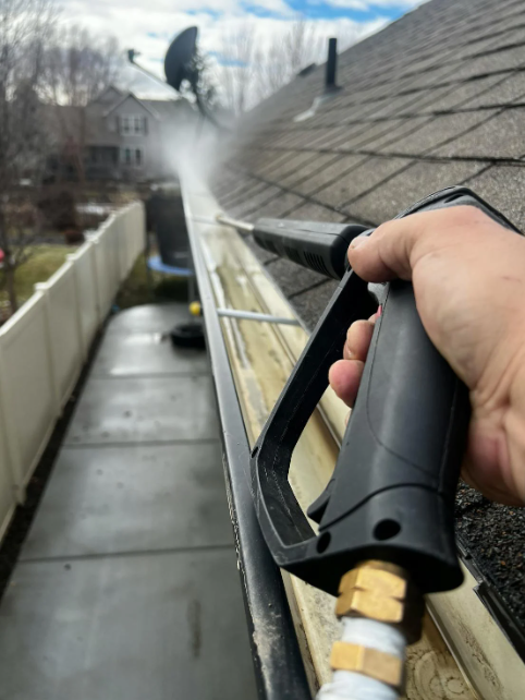 New guttering and downpipe installation